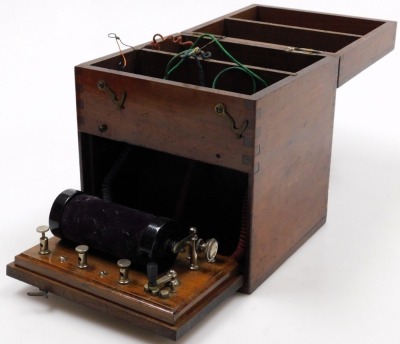 A Victorian mahogany cased electropathy machine, with a partially fitted interior, 17cm wide, together with a Victorian mahogany and rosewood banded money box, 15cm wide. (2)(AF) - 2