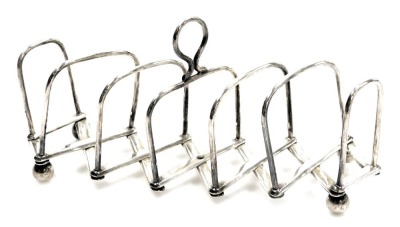 A 19thC silver plated telescopic expanding toast rack.