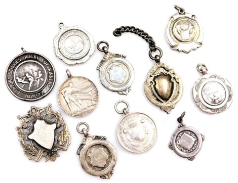 Various silver shield fobs, to include Football Association, Snooker, Football League, Rugby Cup, Darts, and others, many with inscriptions, all circa 1930s and later, 110g all in.