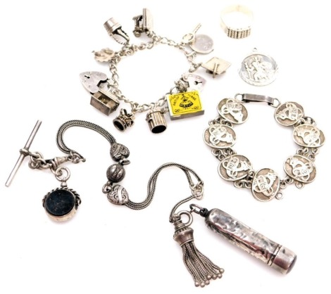 Various silver and other jewellery, comprising a silver cheroot case, a white metal watch chain, with T bar, heart shaped padlock and agate set swivel fob, a silver dress ring, silver charm bracelet, various charms, and an Eastern white metal bracelet, wi