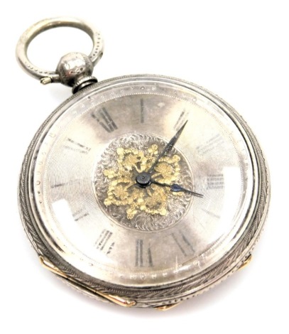 A late 19thC silver pocket watch, with engine engraved floral case and vacant cartouche, with a silvered Roman numeric dial, and raised filigree style gold flower decoration, with blue hands, key wind, inscribed Pearce, Stratford upon Avon, white metal s