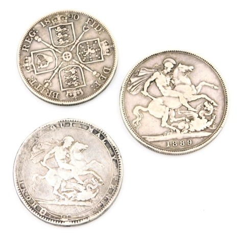 Two George III and later crowns, comprising one dated 1820, and a Victoria crown dated 1889, together with a florin dated 1890, 80.4g all in. (3)