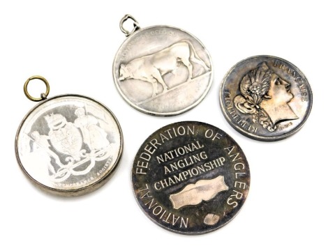 A group of silver and white metal associated medallions, comprising The Silver Agricultural medallion, a silver National Angling Association medallion, a silver Belgian Best Bull presentation medallion, and a Temperance Society medallion, 184.5g all in, o