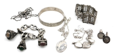 A group of silver and other costume jewellery, comprising bangle, cufflinks, gate bracelet, various lockets and chains, etc., some stone set, 129.1g all in. (a quantity)