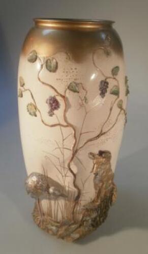 A large Doulton relief vase