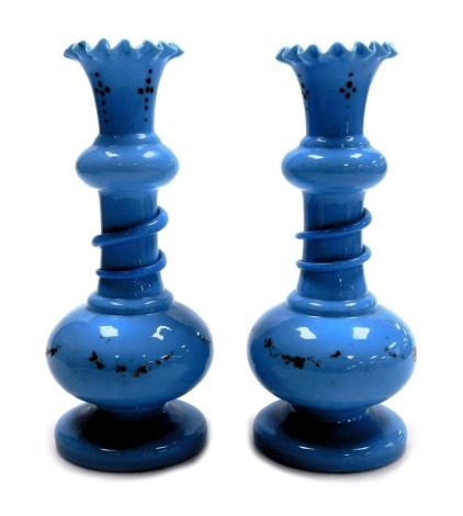 A pair of Victorian turquoise blue glass vases, of double baluster form with flared crimped rims, traces of painted swag decoration, 28cm high.