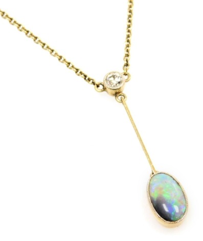 An Edwardian fire opal and diamond drop pendant, set in yellow metal, stamped 15ct, on a neck chain, with bolt ring clasp, diamond approximately &#8539? ct, 3.8g.