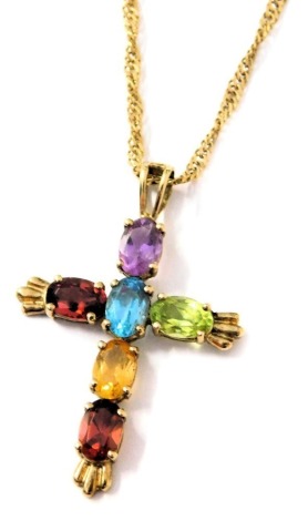 A 9ct gold and gem set pendant cross, on a curb link neck chain, with bolt ring clasp, 4.9g.