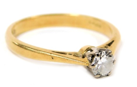 An 18ct gold and diamond solitaire ring, in a high claw setting, approximately ¼ct, size L, 2.3g.