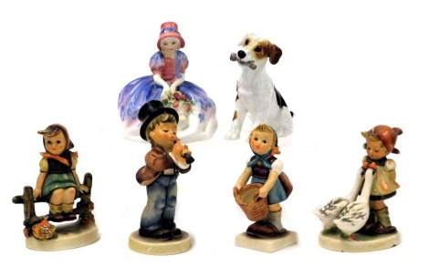 A Royal Doulton figure modelled as Monica, HN1467, Royal Doulton figure of a terrier, HN1159, and four Hummel figures. (6)(AF)