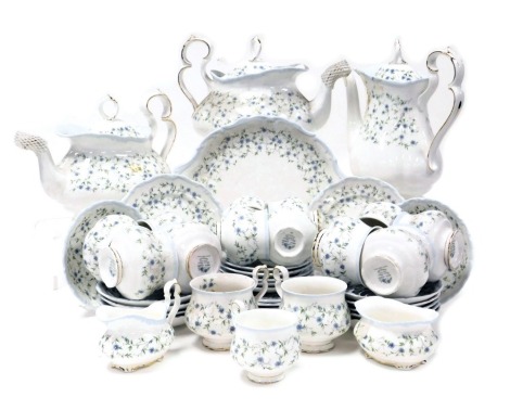 A Royal Albert porcelain Caroline pattern tea and coffee service, comprising pair of teapots, coffee pot, bread plate, cream jug and sugar bowl, ten teacups, eleven saucers, six tea plates, five coffee cups and saucers.