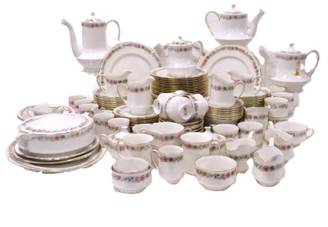 A Royal Albert and Paragon porcelain Belinda pattern dinner tea and coffee service, comprising oval meat platter, three sauce boats, vegetable tureen and cover, two oval serving dishes, seven dinner, twenty four dessert and fifteen side plates, twenty one