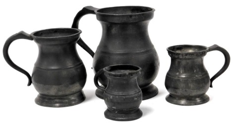 Four 19thC pewter tankards, comprising quart, pint, half pint and gill.