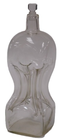 A Victorian cut glass decanter, with matched stopper, of hour glass form, 27.5cm high.