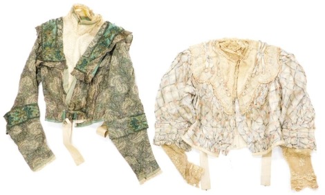 Two Victorian lady's dress jackets, comprising a printed floral embroidered example, with lace collar, by JH Small & Son, Costumiers of Boston, the other rose patterned grey silk, with floral lacework.