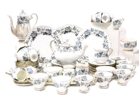 A Royal Albert porcelain Silver Maple pattern part dinner tea and coffee service, including tea pot, coffee pot, sandwich plate, bread plate, five dinner plates, cream jugs and sugar bowls, tea and coffee cups and saucers.