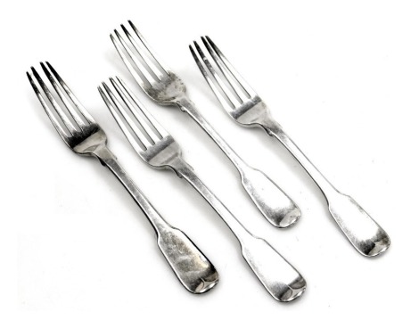 Three George IV silver Old English pattern dessert forks, London 1827, and a William IV Old English pattern dessert fork, London 1834, 5.81oz.