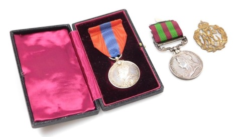 An Victoria India General Service Medal, with Punjab Frontier 1897-98 clasp, inscribed to 4490 Pte J Barnett 4th Dragoon Gds, and a George V Faithful Service Medal inscribed to John Edward Barnett, in fitted case, and a Royal Flying Corps brass cap badge,