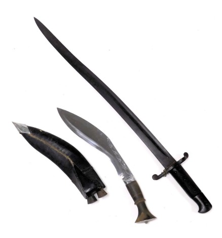 A 19thC 1860 pattern Enfield Yataghan sword bayonet, lacking scabbard, and a bone handled kukri knife, with scabbard. (2)