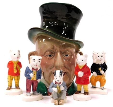 Five Beswick pottery Rupert and His Friends figures, comprising Rupert the Bear, Bill Badger, Algy Pug, Rupert Snowballing, and Pang Ping, together with a Beswick pottery character jug modelled as Micawber. (6)