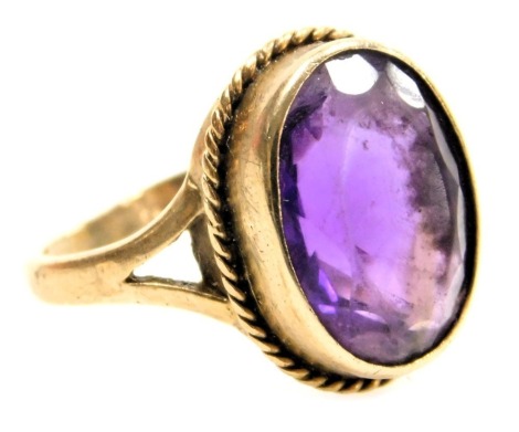 A 9ct gold and amethyst single stone ring, oval cut, size L, 3.9g.