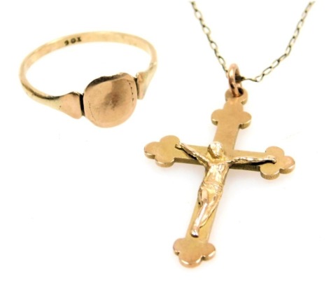 A lady's signet ring, stamped 9ct, size Q, 1.3g, together with a 9ct gold crucifix, on a base metal chain, crucifix approx 2.5g.