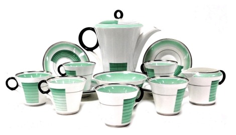 A Shelley Art Deco porcelain part coffee service, number W12207, printed and painted marks, comprising coffee pot, cream jug, sugar bowl, six coffee cups and saucers.