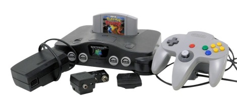 A Nintendo 64 Control Deck, Rumble Pak, games controller, and a Pokemon Stadium game.