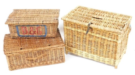 Three wicker hamper baskets.