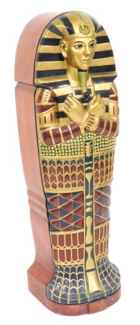 A mahogany and painted novelty CD cabinet, modelled as a Pharoah's sarcophagus, 119cm high.