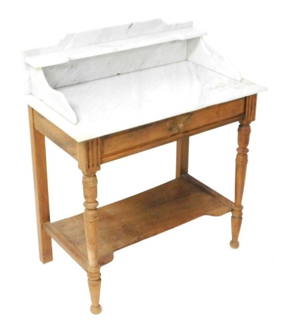 A Victorian mahogany and marble topped washstand, with a galleried back, above a frieze drawer, raised on turned legs united by an under tier, 93cm high, 80cm wide, 45cm deep.