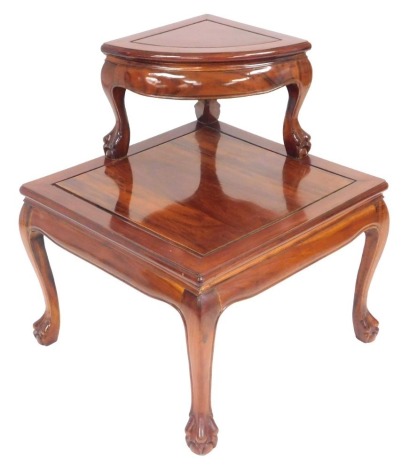 A Chinese hardwood coffee table, of square section, raised on cabriole legs and lion's paw feet, 44cm high, 62cm wide, 62cm, together with a corner table, or stool, raised on cabriole legs and lion's paw feet, 48cm wide. (2)