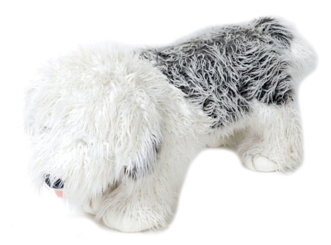 A late 20thC child's novelty stool, modelled as an Old English sheep dog, 97cm wide.