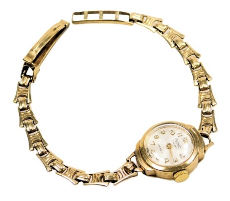 A Precimax Incabloc 9ct gold case lady's wristwatch, silvered dial bearing Arabic numerals, seventeen jewelled movement, the circular case of plain form, on a 9ct gold bracelet strap, 11.6g all in.