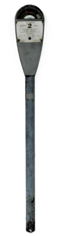 A late 20thC Venner grey painted metal parking meter, accepting 4d and one shilling coins only, 141cm high.