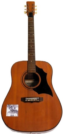 A Kay KD-28 acoustic guitar.