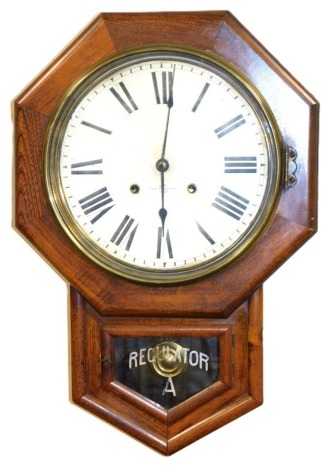 An early 20thC Japanese oak cased drop dial wall clock, circular dial, manufactured by Seiko Sha, Tokyo, Japan, eight day movement, the case of octagonal form, above a glazed door painted "Regulator A", 62cm high.