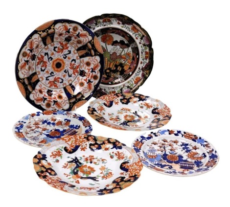 A group of 19thC Masons Ironstone plates, variously Imari decorated with flowers, comprising a soup plate, dinner plate and four smaller plates.