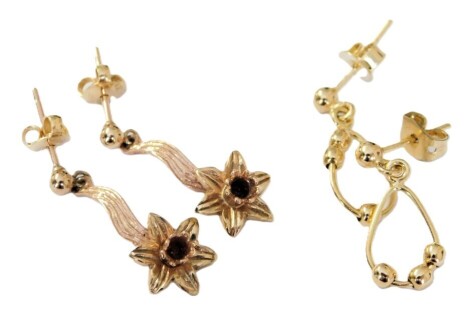 A pair of 9ct two colour gold daffodil drop earrings, and a pair of 9ct gold hoop and ball earrings, 4.4g.