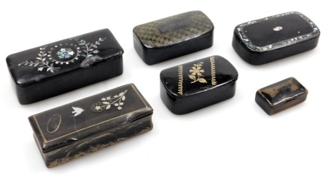 Five Victorian papier mache snuff boxes, some with mother of pearl inlay.