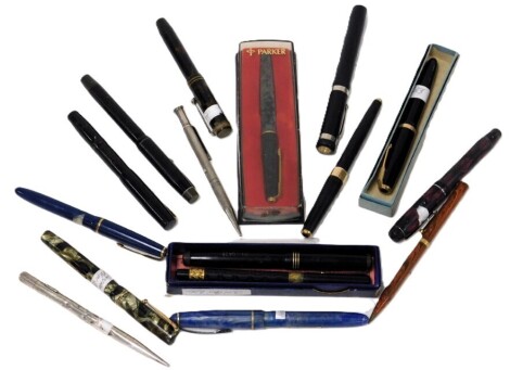 A group of fountain pens, including Parker, Osmiroid and Swan, together with two silver pencils. (qty)