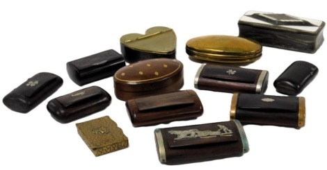 A 19thC brass tobacco box, of heart form, later stipple engraved with a biplane, together with a brass and wooden snuff box, Bakelite vesta case and a horn snuff box. (qty)