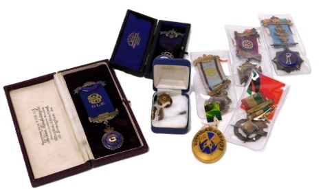 Six Masonic silver and enamel jewels, together with a Nottinghamshire council badge, and a pair of Masonic lapel badges.