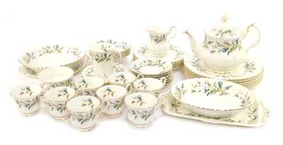 A Royal Albert porcelain part tea and dinner service decorated in the Brigadoon pattern, comprising a teapot and stand, milk jug, sugar bowl, eight teacups, eight saucers, six cake plates, rectangular sandwich plate, two bowls, one coffee cup, five breakf