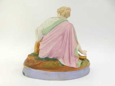 A 19thC French bisque porcelain figure group, modelled as a seated lady in classical dress beside a Whippet, on an oval base, impressed marks L and M, 29cm high. - 2