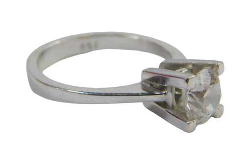 A diamond solitaire ring, set with a round brilliant cut diamond, approx 1.2ct, 6.2mm x 6.2mm x 4.4mm, in a four box claw setting, on a white gold band in a raised basket, stamped 750, size J, 3.6g all in. Upon initial inspection colour H-I, clarity I1/2,