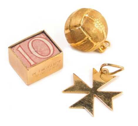 Three loose 9ct gold charms, comprising a cross, football and ten shilling note, 5g. (3)