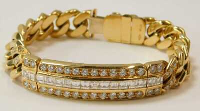 An 18ct gold diamond identity bracelet, the panel with round brilliant cut diamonds, 88.6g all in, approx 20cm long. - 2