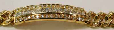 An 18ct gold diamond identity bracelet, the panel with round brilliant cut diamonds, 88.6g all in, approx 20cm long. - 3