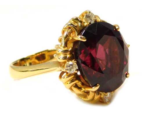 A H Senna 18ct gold oval cluster diamond and garnet ring, size L.